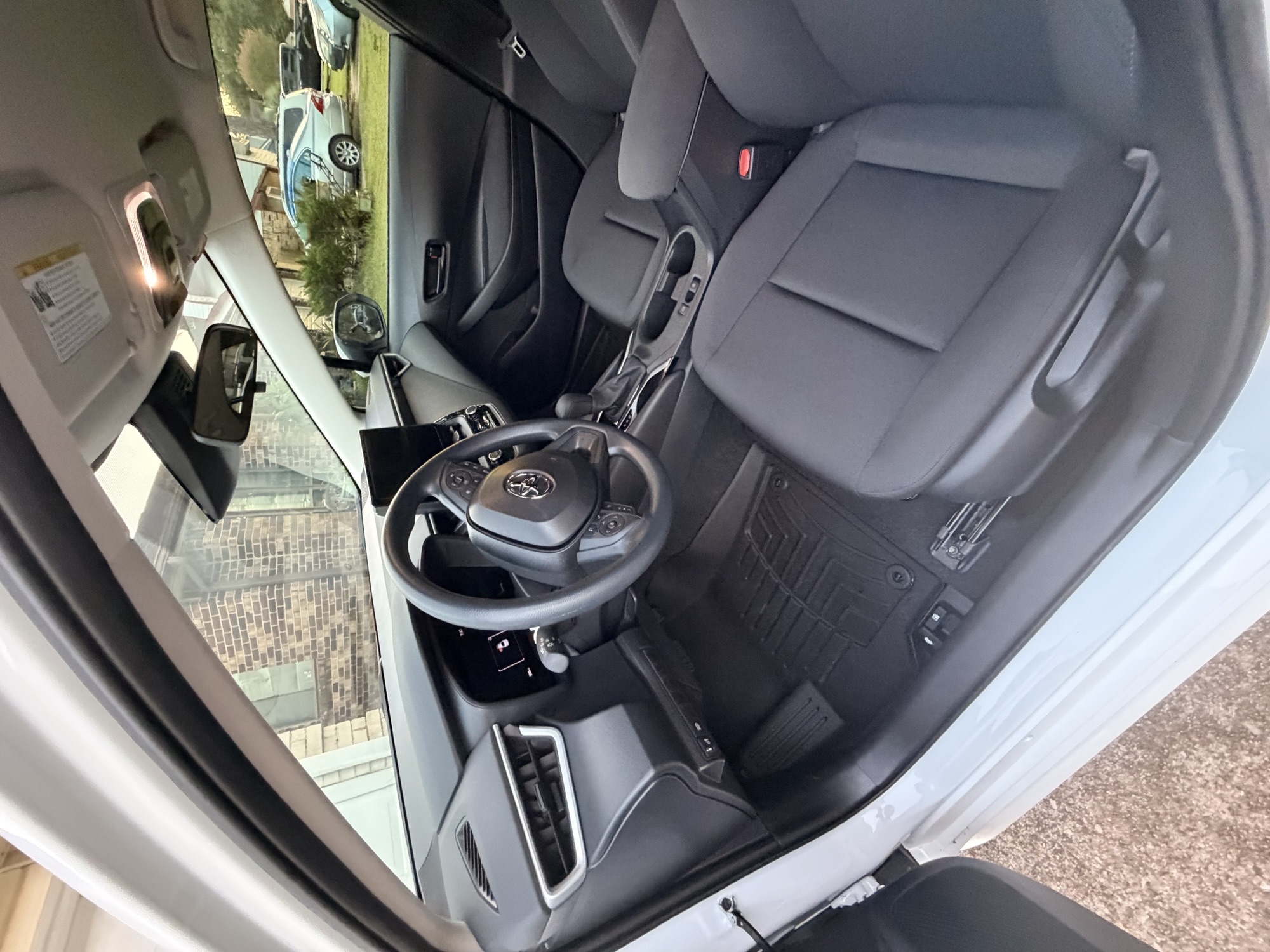 Toyota Corolla interior vacuumed and wiped down