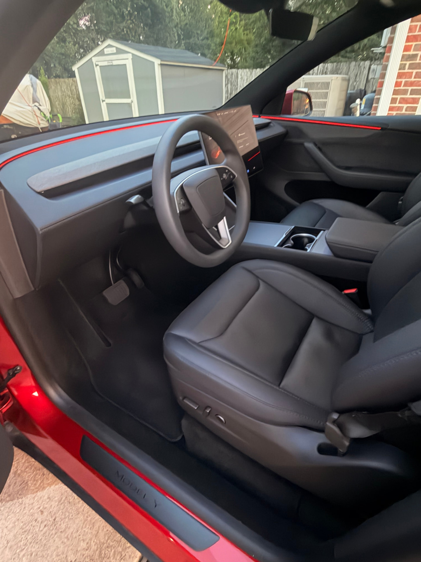 Tesla interior with clean seats, dash and screen
